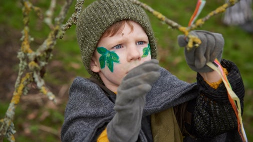 Community tree planting and wassailing at Avalon Orchard, Glastonbury Tor, Somerset